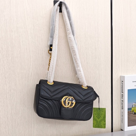 Gucci Black and Gold Shoulder Bag with Iconic GG Hardware - Picture 1 of 9
